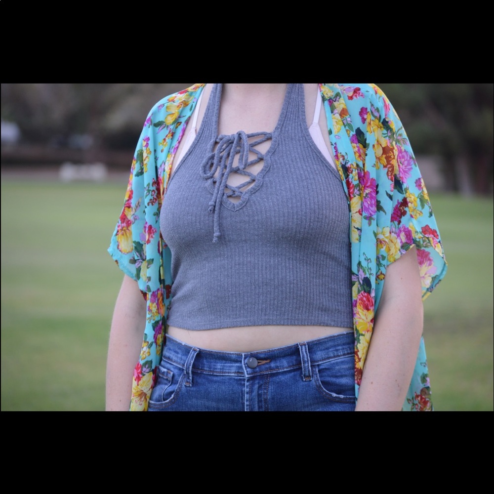 Backless grey hauler top with a tie opening